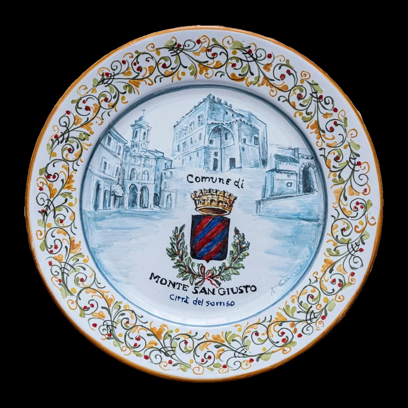 Piatto in maiolica dedicato a Monte San Giusto, città del Lotto, con il palazzo e lo stemma dentro una cornice a girali ocra.